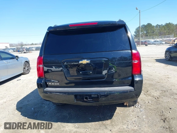 2018 Chevrolet Tahoe LT z VIN 1GNSCBKC7JR254859, wystawiony jako IAAI lot #41620074 z przebiegiem 124 714 mil mil oraz . Historia ofert i sprzedaży dostępna na DreamBid. Obrazek 16.