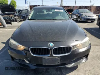 2014 BMW 3 Series 320i with VIN WBA3B1C56EP678722, listed as a Copart auction lot 61504625 with 158,903 mi miles and Clean title. Bid and sale history available at DreamBid. Image 5.
