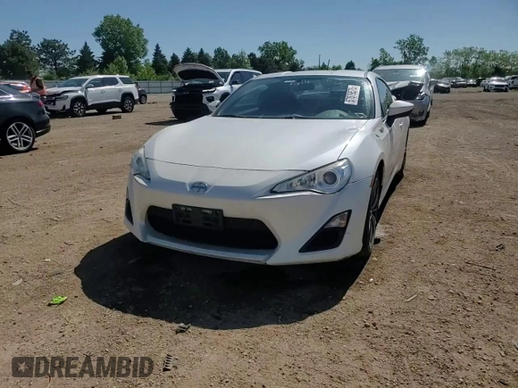 2014 Scion FR-S z VIN JF1ZNAA16E8702862, wystawiony jako Copart lot #57879575 z przebiegiem 101 775 mil mil oraz Szkoda całkowita • Salvage title. Historia ofert i sprzedaży dostępna na DreamBid. Obrazek 13.