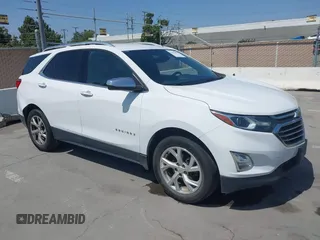 2020 Chevrolet Equinox Premier z VIN 2GNAXXEV5L6200498, wystawiony jako IAAI lot #42437887 z przebiegiem 225 639 mil mil oraz . Historia ofert i sprzedaży dostępna na DreamBid. Obrazek 1.