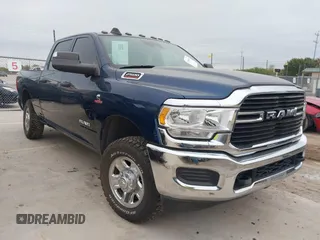 2021 Ram 2500 Tradesman with VIN 3C6UR5CL4MG584602, listed as a IAAI auction lot 40994669 with 68,000 mi miles. Bid and sale history available at carsss.com. Image 1.