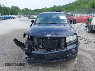 2011 Jeep Grand Cherokee Laredo with VIN 1J4RR4GG8BC543468, listed as a IAAI auction lot 42431481 with 224,639 mi miles and . Bid and sale history available at DreamBid. Image 12.
