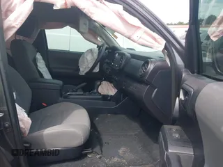 2020 Toyota Tacoma SR z VIN 5TFRZ5CN0LX088271, wystawiony jako IAAI lot #42169345 z przebiegiem 75 654 mil mil oraz . Historia ofert i sprzedaży dostępna na DreamBid. Obrazek 5.