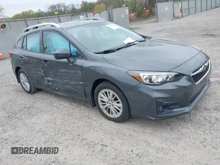 2018 Subaru Impreza Premium z VIN 4S3GTAD61J3703780, wystawiony jako IAAI lot #42081604 z przebiegiem 79 757 mil mil oraz . Historia ofert i sprzedaży dostępna na DreamBid. Obrazek 1.