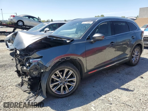2021 Mazda CX-9 Carbon Edition with VIN JM3TCADYXM0519399, listed as a Copart auction lot 52714565 with 72,765 mi miles and Salvage title. Bid and sale history available at DreamBid. Image 1.