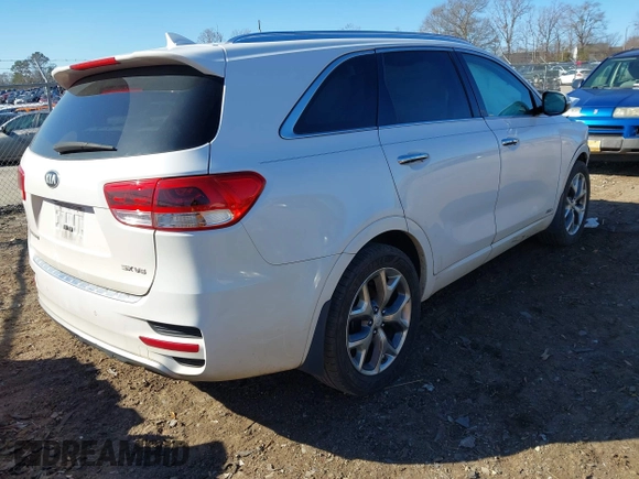 2016 Kia Sorento SX with VIN 5XYPKDA55GG174984, listed as a IAAI auction lot 41216303 with 142,875 mi miles. Bid and sale history available at carsss.com. Image 4.