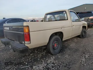 1986 Nissan Hardbody E z VIN JN6ND11S1GW037479, wystawiony jako Copart lot #81775934 z przebiegiem 389 841 mil mil oraz Szkody całkowita. Historia ofert i sprzedaży dostępna na DreamBid. Obrazek 3.
