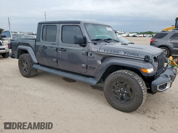 2021 Jeep Gladiator Willys с VIN 1C6HJTAG9ML606731, выставлен на аукционе Copart как лот 59873205 с пробегом 84 811 миль миль и Списание • Salvage title. История ставок и продаж доступна на DreamBid. Изображение 4.