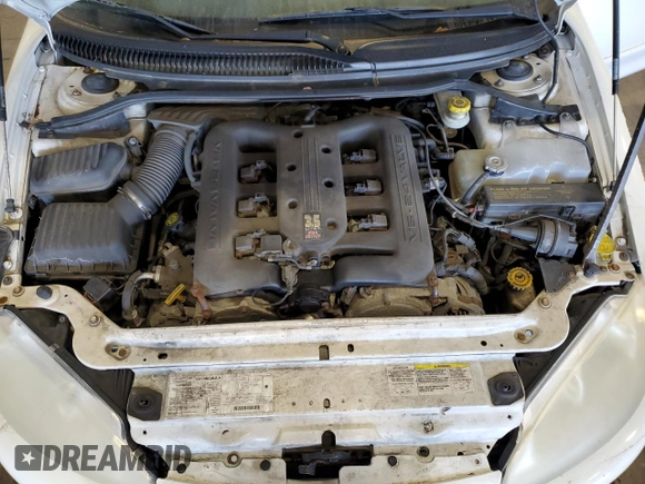 2004 Dodge Intrepid ES z VIN 2B3HD56G14H599924, wystawiony jako Copart lot #79411364 z przebiegiem 197 523 mil mil oraz Szkoda całkowita • Salvage title. Historia ofert i sprzedaży dostępna na DreamBid. Obrazek 11.