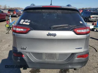 2014 Jeep Cherokee Altitude with VIN 1C4PJMCS9EW232388, listed as a Copart auction lot 82842674 with 169,458 mi miles and Salvage Title. Bid and sale history available at carsss.com. Image 6.