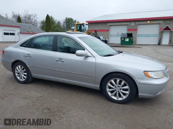 2006 Hyundai Azera SE z VIN KMHFC46F46A077702, wystawiony jako IAAI lot #42088782 z przebiegiem 103 033 mil mil oraz . Historia ofert i sprzedaży dostępna na DreamBid. Obrazek 15.
