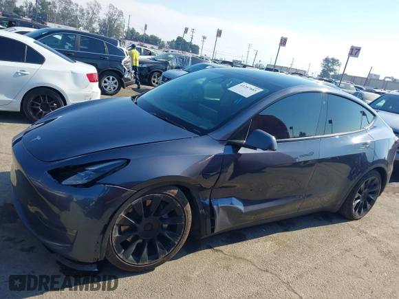 2022 Tesla Model Y Long Range z VIN 7SAYGDEE4NF522698, wystawiony jako IAAI lot #41287885 z przebiegiem 82 306 mil mil oraz . Historia ofert i sprzedaży dostępna na DreamBid. Obrazek 14.