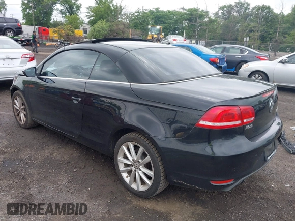 2014 Volkswagen Eos Sport with VIN WVWBW8AH2EV003356, listed as a IAAI auction lot 42394312 with 70,448 mi miles and . Bid and sale history available at DreamBid. Image 3.