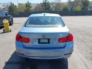 2014 BMW 3 Series 328i with VIN WBA3C1C51EK115278, listed as a IAAI auction lot 41979591 with 129,112 mi miles. Bid and sale history available at carsss.com. Image 17.