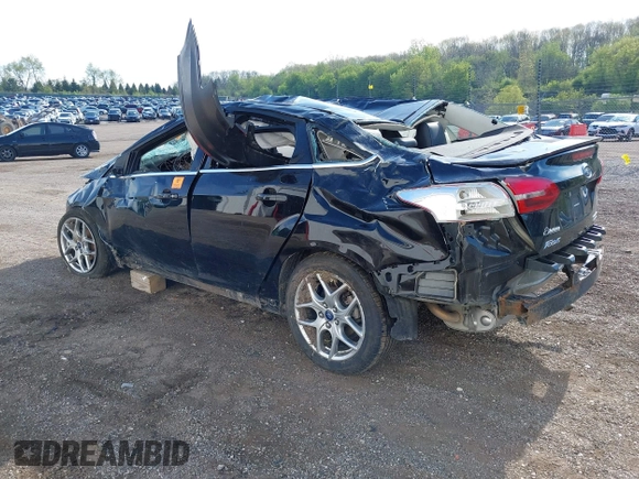 2016 Ford Focus Titanium with VIN 1FADP3J22GL242818, listed as a IAAI auction lot 42177015 with Not provided miles and . Bid and sale history available at DreamBid. Image 3.