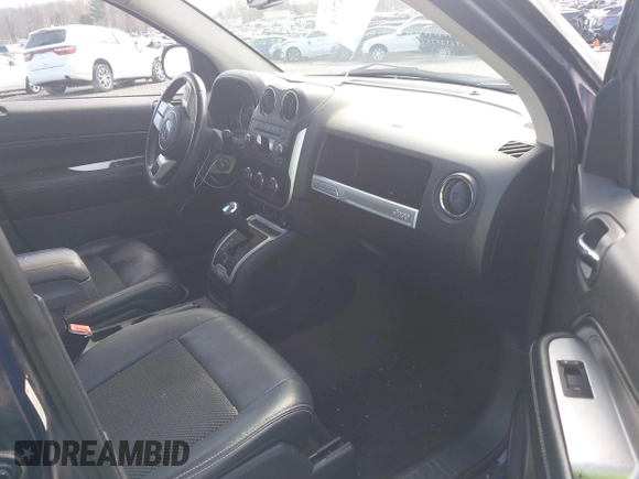 2016 Jeep Compass Latitude with VIN 1C4NJCEA9GD648025, listed as a IAAI auction lot 41558791 with 122,273 mi miles. Bid and sale history available at carsss.com. Image 5.