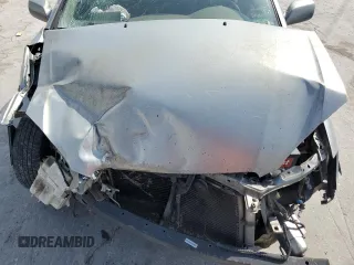 2004 Toyota Corolla CE with VIN 1NXBR32E74Z240293, listed as a Copart auction lot 52624445 with 299,999 mi miles and Salvage Title. Bid and sale history available at DreamBid. Image 12.