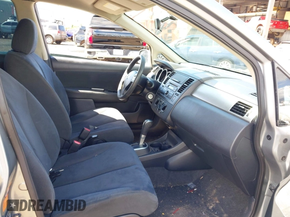 2009 Nissan Versa 1.8 SL with VIN 3N1BC13E79L388487, listed as a IAAI auction lot 42078888 with 44,488 mi miles. Bid and sale history available at carsss.com. Image 5.