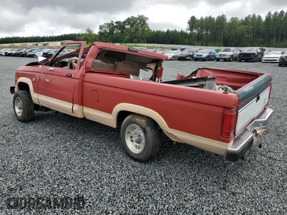 1987 Ford Ranger with VIN 1FTBR10T7HUC19721, listed as a Copart auction lot 83959854 with 33,497 mi miles and Salvage Title. Bid and sale history available at DreamBid. Image 2.