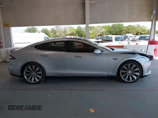 2013 Tesla Model S Performance with VIN 5YJSA1DP6DFP07999, listed as a IAAI auction lot 42284612 with 123,261 mi miles and . Bid and sale history available at DreamBid. Image 14.