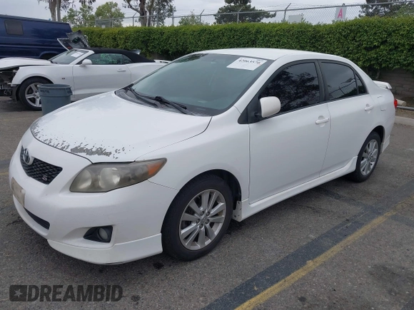 2010 Toyota Corolla with VIN 1NXBU4EE5AZ240272, listed as a IAAI auction lot 42063570 with 230,612 mi miles. Bid and sale history available at carsss.com. Image 2.
