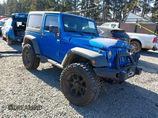 2015 Jeep Wrangler Sport z VIN 1C4AJWAG4FL613682, wystawiony jako IAAI lot #41563054 z przebiegiem 65 880 mil mil oraz . Historia ofert i sprzedaży dostępna na DreamBid. Obrazek 1.