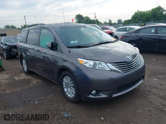 2014 Toyota Sienna XLE with VIN 5TDYK3DC0ES496716, listed as a IAAI auction lot 42494549 with 158,645 mi miles and . Bid and sale history available at DreamBid. Image 1.