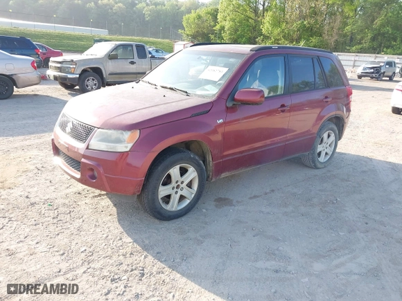2006 Suzuki Grand Vitara Luxury with VIN JS3TD947564104838, listed as a IAAI auction lot 42082783 with 122,912 mi miles. Bid and sale history available at carsss.com. Image 2.