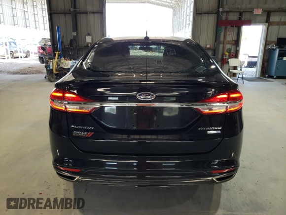 2018 Ford Fusion Titanium с VIN 3FA6P0D9XJR241506, выставлен на аукционе Copart как лот 60736525 с пробегом 109 548 миль миль и Списание • Salvage title. История ставок и продаж доступна на DreamBid. Изображение 6.