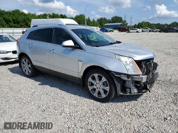 2015 Cadillac SRX Performance Collection with VIN 3GYFNCE3XFS573287, listed as a Copart auction lot 59927205 with 157,322 mi miles and Salvage title. Bid and sale history available at DreamBid. Image 4.