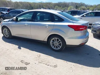 2017 Ford Focus SE z VIN 1FADP3F21HL237412, wystawiony jako IAAI lot #42188886 z przebiegiem 148 355 mil mil oraz . Historia ofert i sprzedaży dostępna na DreamBid. Obrazek 3.