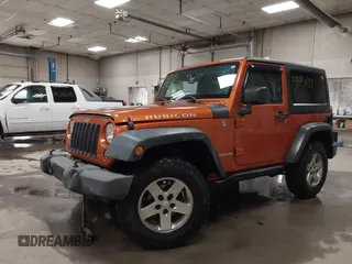 2011 Jeep Wrangler Rubicon with VIN 1J4BA6D15BL624268, listed as a IAAI auction lot 41430121 with 142,433 mi miles and . Bid and sale history available at carsss.com. Image 18.