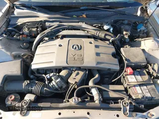 1999 Acura RL with VIN JH4KA9661XC005883, listed as a IAAI auction lot 40560595 with 165,195 mi miles. Bid and sale history available at carsss.com. Image 10.