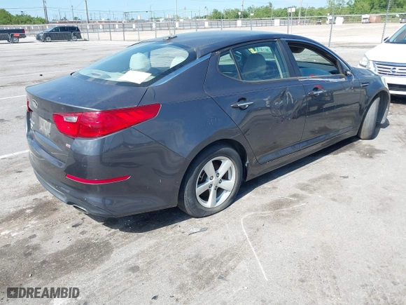 2015 Kia Optima LX with VIN KNAGM4A71F5634755, listed as a IAAI auction lot 42019729 with 101,064 mi miles. Bid and sale history available at carsss.com. Image 4.