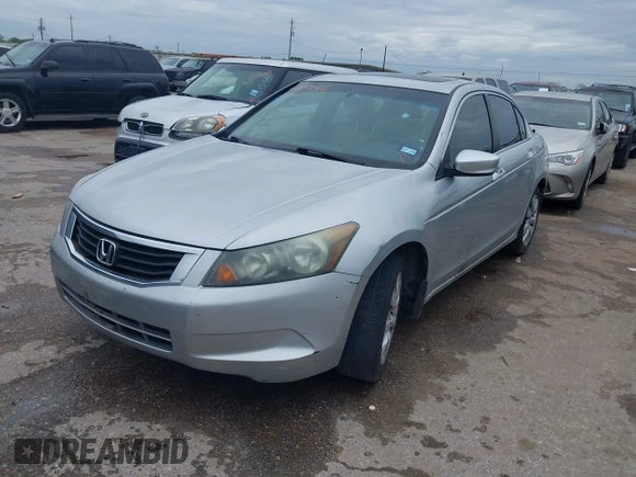 2009 Honda Accord EX-L z VIN 1HGCP26899A104089, wystawiony jako IAAI lot #41897066 z przebiegiem 197 573 mil mil oraz . Historia ofert i sprzedaży dostępna na DreamBid. Obrazek 2.