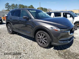2018 Mazda CX-5 Grand Touring with VIN JM3KFADM2J1313418, listed as a Copart auction lot 49486875 with 94,930 mi miles and Salvage Title. Bid and sale history available at carsss.com. Image 4.