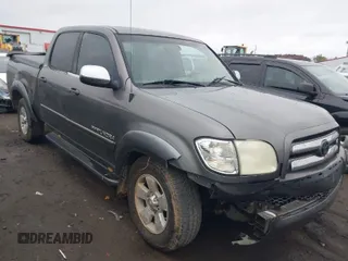 2004 Toyota Tundra SR5 with VIN 5TBDT44144S437417, listed as a IAAI auction lot 40900712 with 422,411 mi miles and . Bid and sale history available at DreamBid. Image 1.