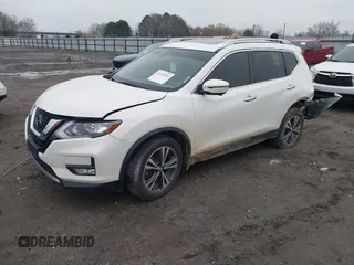 2019 Nissan Rogue SV with VIN JN8AT2MT4KW263267, listed as a IAAI auction lot 41155792 with 106,668 mi miles. Bid and sale history available at carsss.com. Image 2.