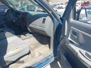 2005 Dodge Dakota SLT with VIN 1D7HE42N85S194847, listed as a IAAI auction lot 41880048 with 289,575 mi miles and . Bid and sale history available at DreamBid. Image 5.