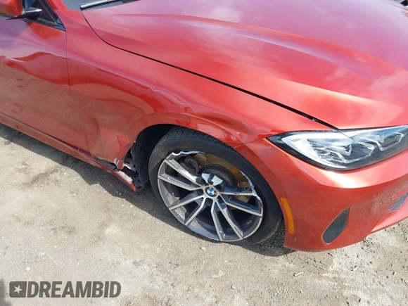 2022 BMW 4 Series 430i with VIN WBA53AP04NCK23797, listed as a IAAI auction lot 41583184 with 42,069 mi miles and . Bid and sale history available at carsss.com. Image 6.