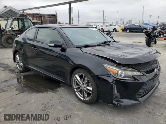 2015 Scion tC z VIN JTKJF5C75F3093123, wystawiony jako Copart lot #58414325 z przebiegiem 107 051 mil mil oraz Szkoda całkowita • Salvage title. Historia ofert i sprzedaży dostępna na DreamBid. Obrazek 4.