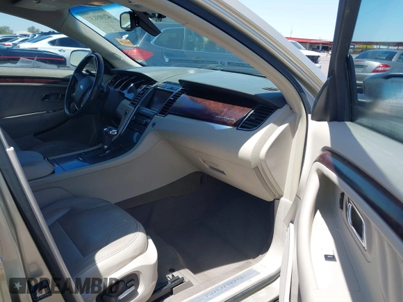 2010 Ford Taurus Limited with VIN 1FAHP2FW1AG140417, listed as a IAAI auction lot 42105832 with 118,403 mi miles. Bid and sale history available at carsss.com. Image 5.