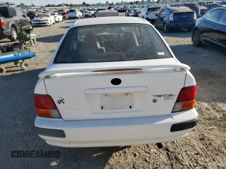 1995 Toyota Tercel DX z VIN JT2EL56D0S0108750, wystawiony jako Copart lot #75322364 z przebiegiem 200 116 mil mil oraz Szkody całkowita. Historia ofert i sprzedaży dostępna na DreamBid. Obrazek 7.