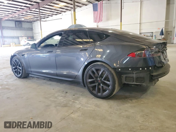 2021 Tesla Model S Long Range with VIN 5YJSA1E51MF429302, listed as a Copart auction lot 58242465 with 148,472 mi miles and Salvage title. Bid and sale history available at DreamBid. Image 2.