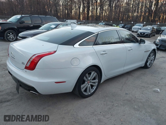 2017 Jaguar XJ with VIN SAJWJ2GD5H8W08395, listed as a IAAI auction lot 41014883 with 80,584 mi miles. Bid and sale history available at carsss.com. Image 4.