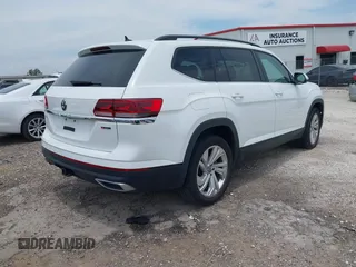 2021 Volkswagen Atlas SE with VIN 1V2HR2CA7MC556625, listed as a IAAI auction lot 42401730 with 75,261 mi miles and . Bid and sale history available at DreamBid. Image 4.