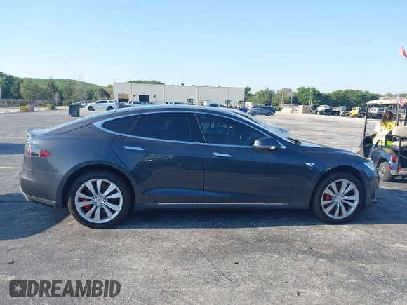 2015 Tesla Model S 85D with VIN 5YJSA1H46FF082264, listed as a IAAI auction lot 42068959 with 98,693 mi miles. Bid and sale history available at carsss.com. Image 13.