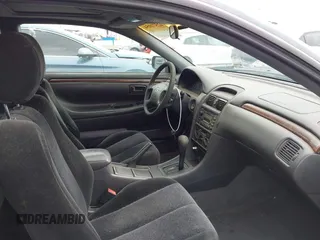 1999 Toyota Solara SE with VIN 2T1CF22P4XC129649, listed as a IAAI auction lot 42571054 with 89,922 mi miles and . Bid and sale history available at DreamBid. Image 5.