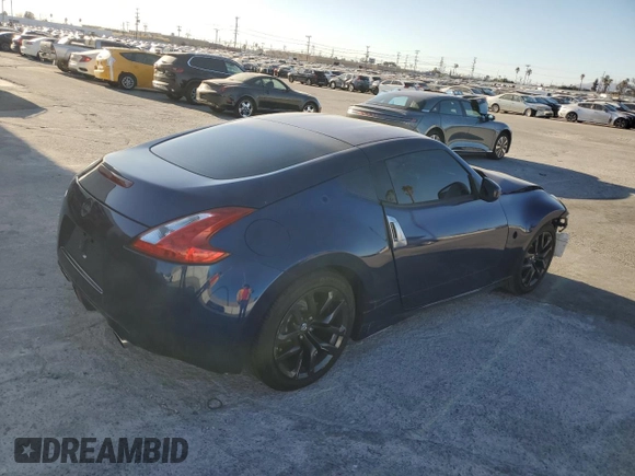 2017 Nissan 370Z z VIN JN1AZ4EH6HM952086, wystawiony jako Copart lot #88158105 z przebiegiem Nie podano mil oraz Szkoda całkowita • Salvage title. Historia ofert i sprzedaży dostępna na DreamBid. Obrazek 3.