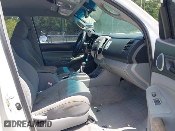 2009 Toyota Tacoma PreRunner with VIN 3TMJU62NX9M091048, listed as a IAAI auction lot 42272791 with 208,257 mi miles and . Bid and sale history available at DreamBid. Image 5.